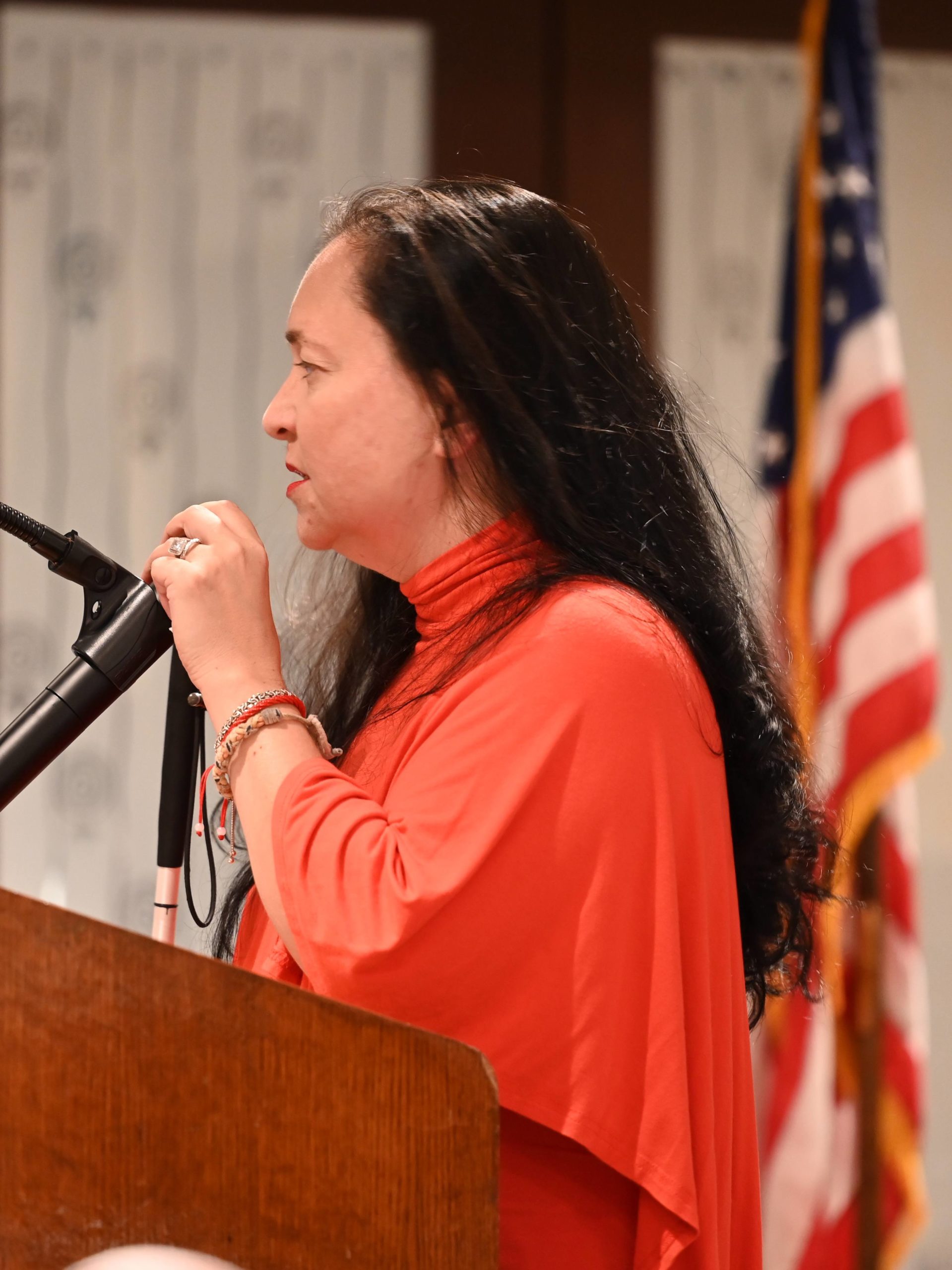 NFB of PA Legislative Director Emily Gindlesperger speaks at a lecturn during the 2022 State Convention in Pittsburgh.