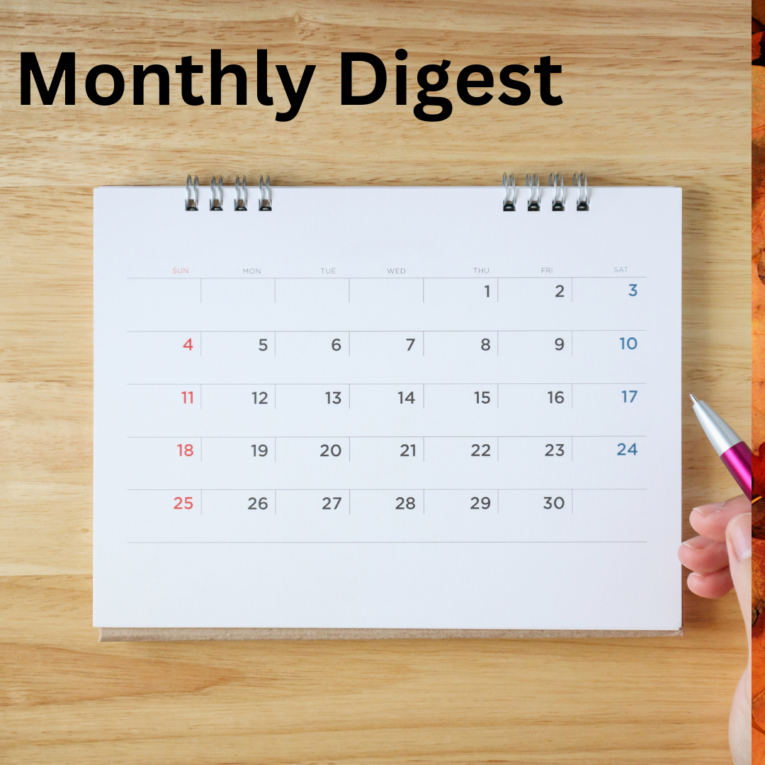 A calendar on a wooden desk, with the words Monthly Digest in black above it.